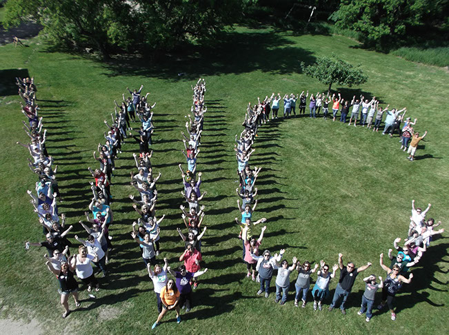 WC letters made with people - Woodland Center